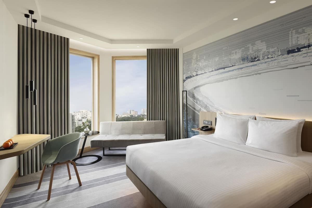 Superior Room, 1 King Bed, City View | Premium bedding, minibar, in-room safe, iron/ironing board