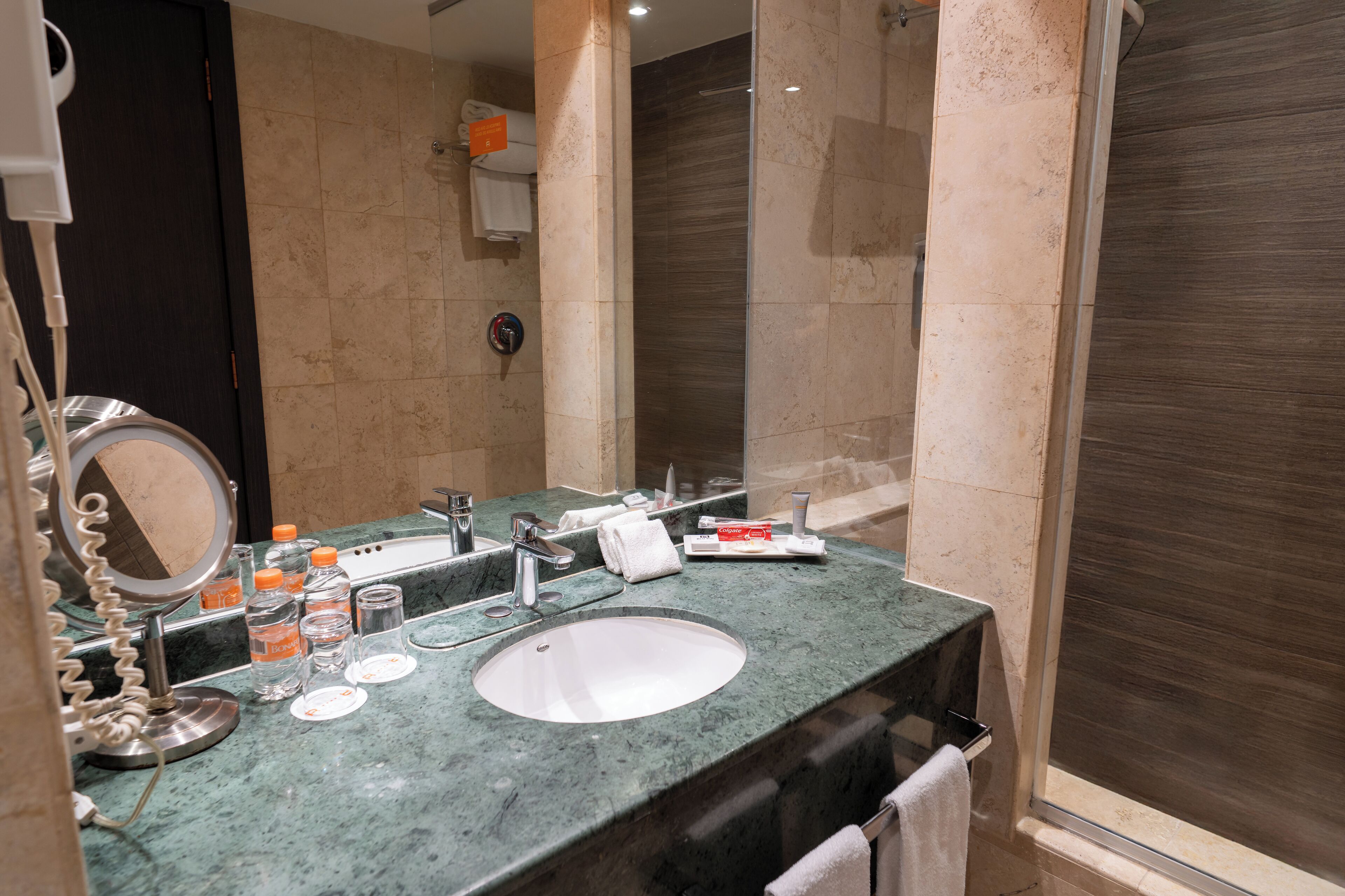 master suite king | bathroom | shower, rainfall showerhead, free toiletries, hair dryer