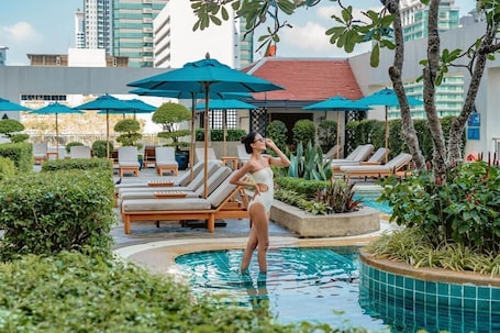 Outdoor pool, open 7:00 AM to 9:00 PM, pool umbrellas, sun loungers