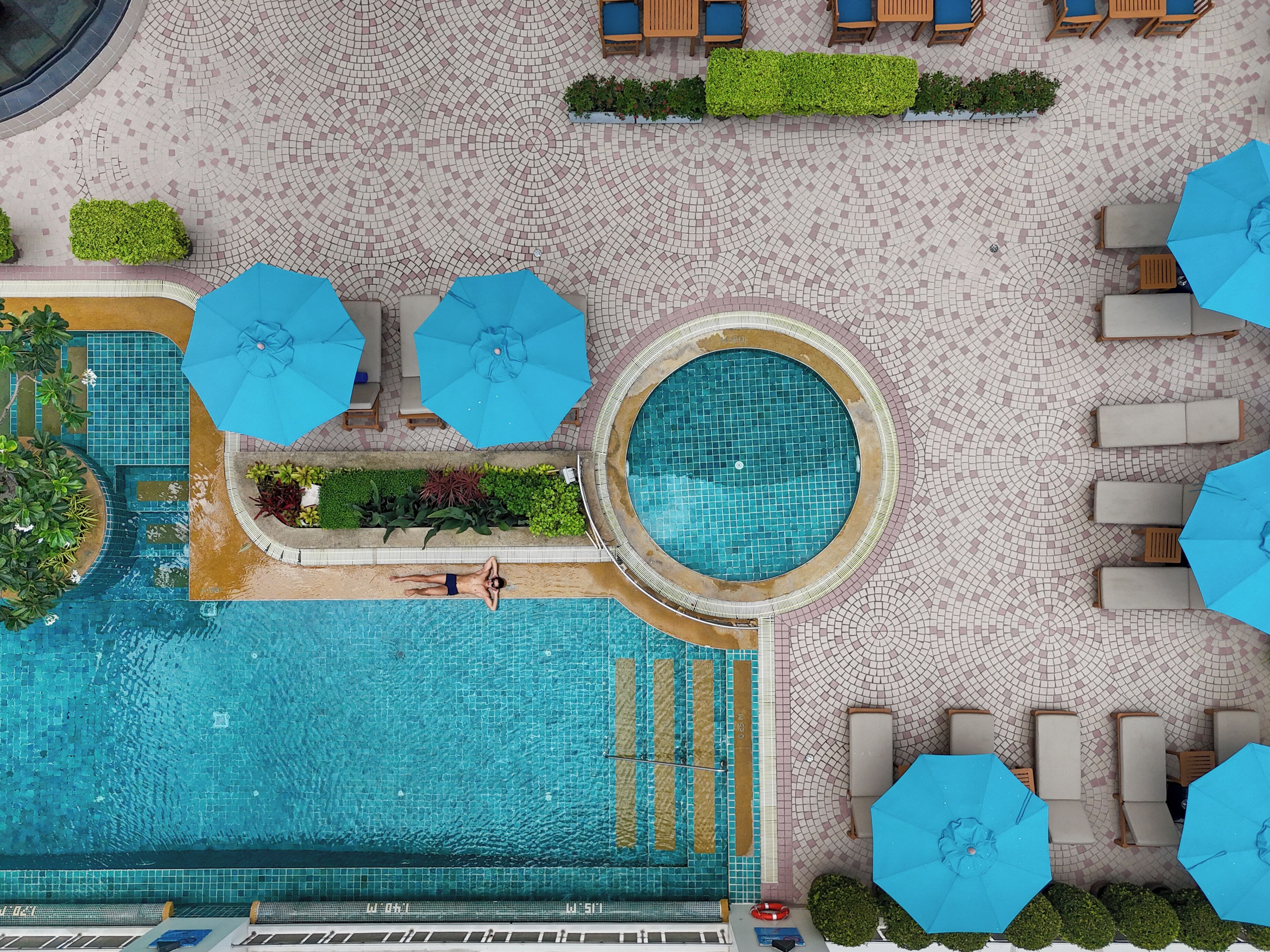 Outdoor pool, open 7:00 AM to 9:00 PM, pool umbrellas, sun loungers