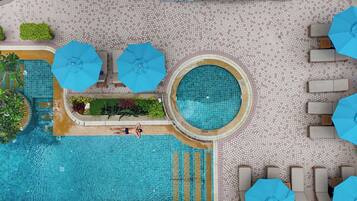 Outdoor pool, open 7:00 AM to 9:00 PM, pool umbrellas, sun loungers
