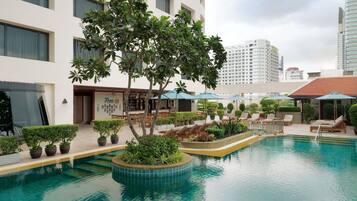 Outdoor pool, open 7:00 AM to 9:00 PM, pool umbrellas, sun loungers