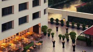 Outdoor pool, open 7:00 AM to 9:00 PM, pool umbrellas, sun loungers