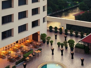Outdoor pool, open 7:00 AM to 9:00 PM, pool umbrellas, sun loungers