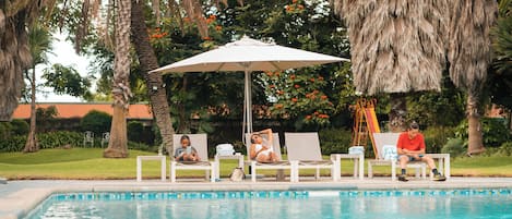 Outdoor pool, pool umbrellas, pool loungers