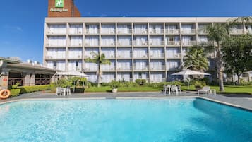 Outdoor pool, pool umbrellas, pool loungers