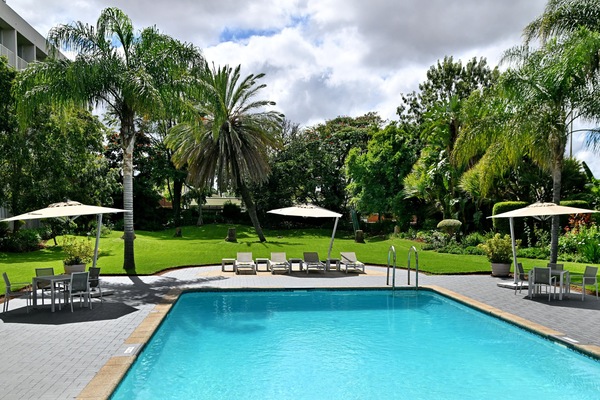 Outdoor pool, pool umbrellas, sun loungers