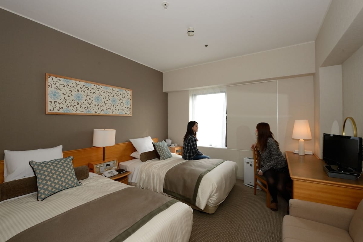 Down comforters, desk, iron/ironing board (on request), WiFi (free)