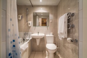 Combined shower/tub, deep soaking tub, free toiletries, hair dryer