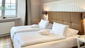 Suite Deluxe | 1 dormitorio, minibar, caja fuerte y escritorio