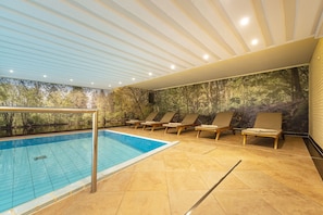 Indoor pool, open 7:30 AM to 9:30 PM, pool loungers