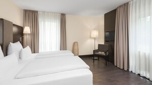Ropa de cama de alta calidad, camas con pillow-top y minibar 