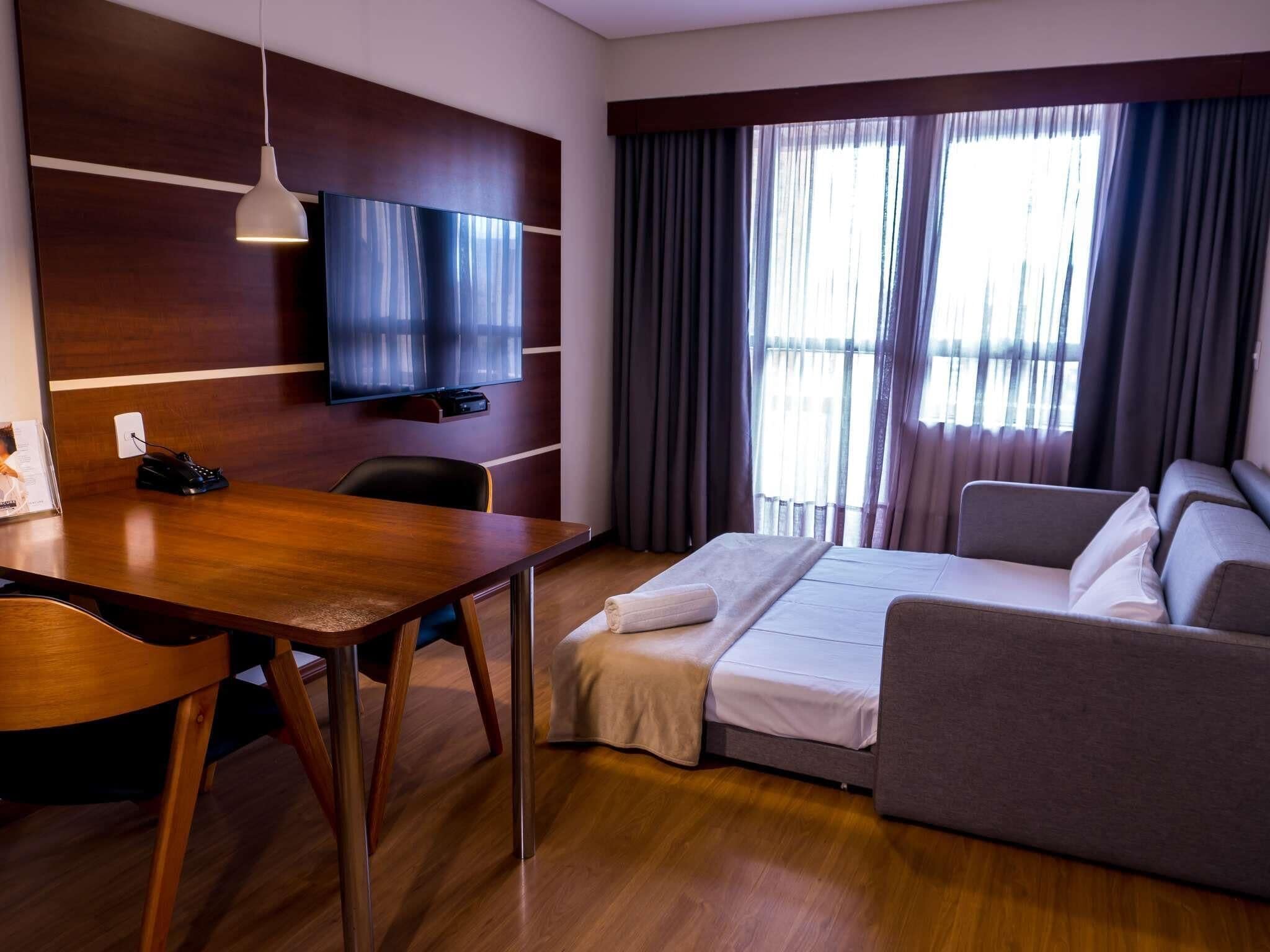 Hypo-allergenic bedding, minibar, in-room safe, desk