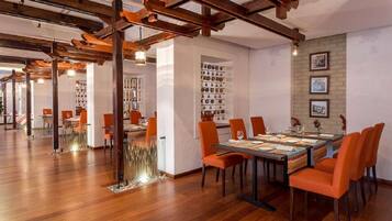 2 restaurants, breakfast, lunch, dinner served; local cuisine