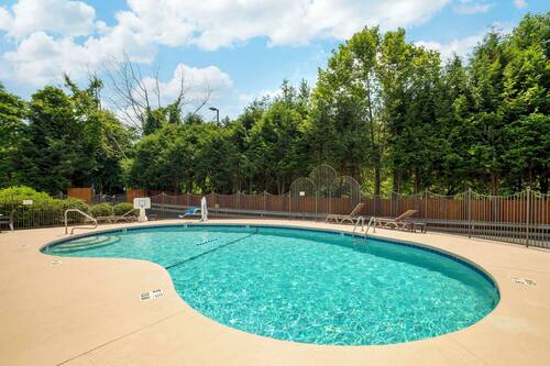 Seasonal outdoor pool, open 10:00 AM to 10:00 PM, sun loungers