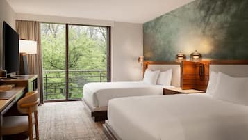 Premium bedding, down comforters, pillowtop beds, in-room safe
