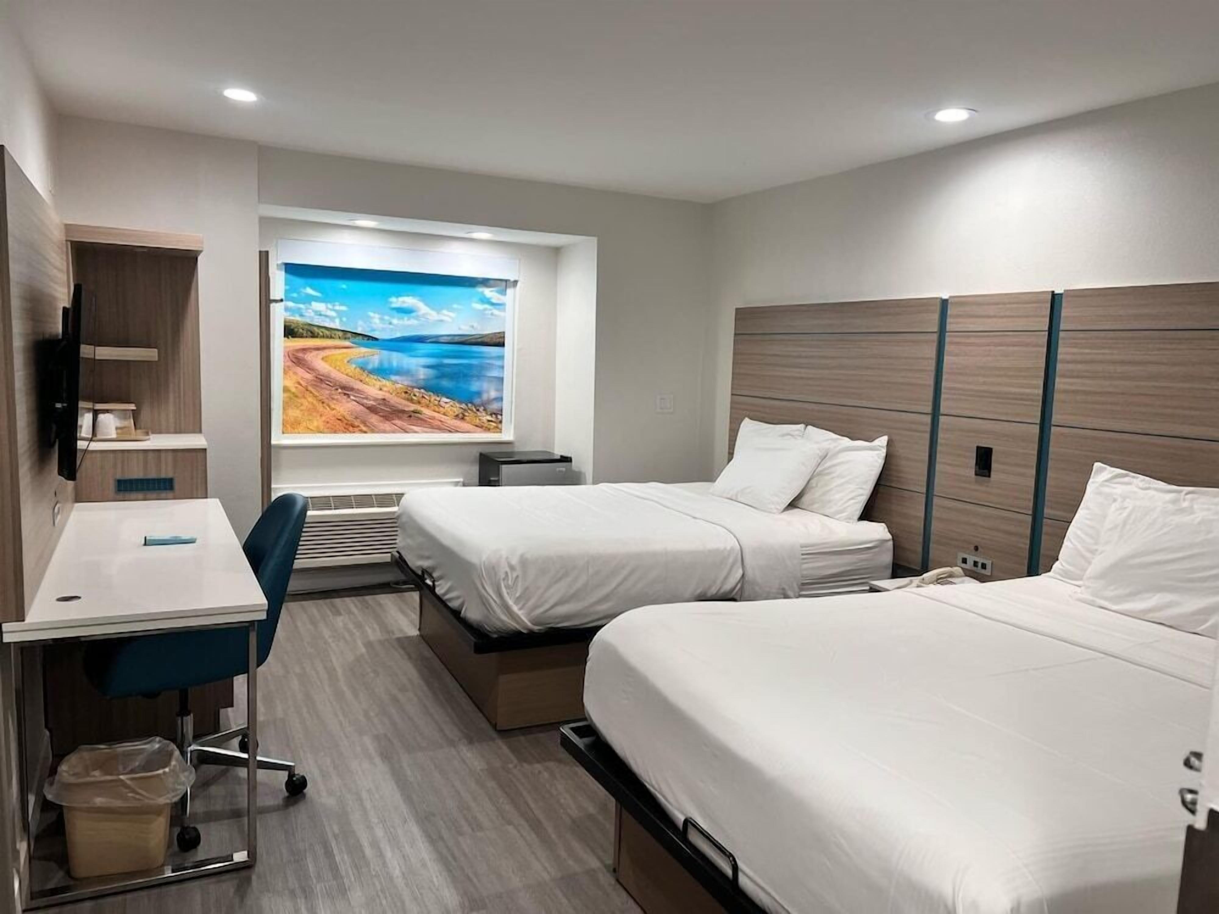 Premium bedding, pillowtop beds, desk, iron/ironing board