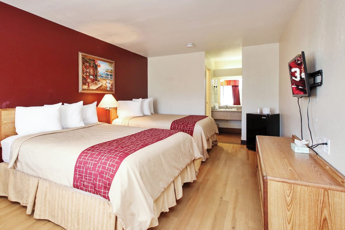 Deluxe Room, 2 Queen Beds (Smoke Free) | Desk, iron/ironing board, free WiFi, bed sheets