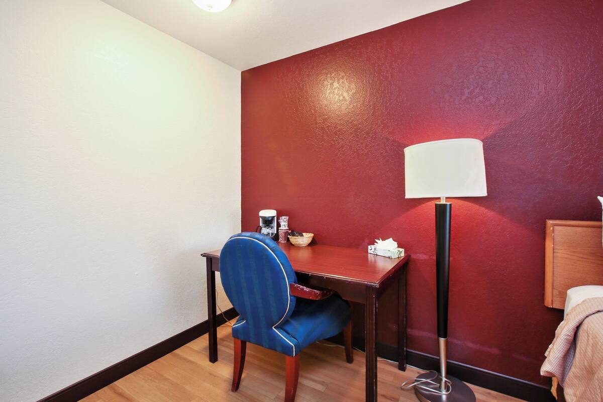 Desk, WiFi (free), alarm clocks, bed sheets