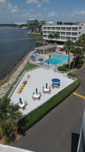 Outdoor pool, a heated pool, pool umbrellas, sun loungers