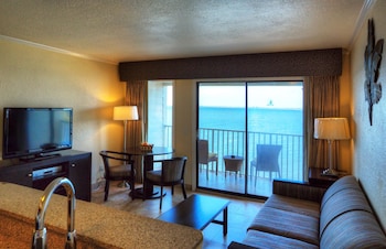 Pillowtop beds, in-room safe, desk, laptop workspace at Sailport Waterfront Suites