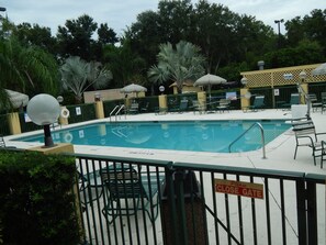 Outdoor pool, open 9:00 AM to 9:00 PM, pool umbrellas, sun loungers