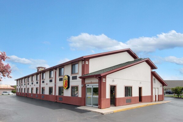 Stay at this Super 8 motel with a central entrance and flat roof.
