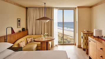 Premium bedding, pillow-top beds, minibar, in-room safe