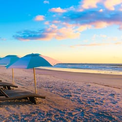 On the beach, sun loungers, beach umbrellas, beach towels