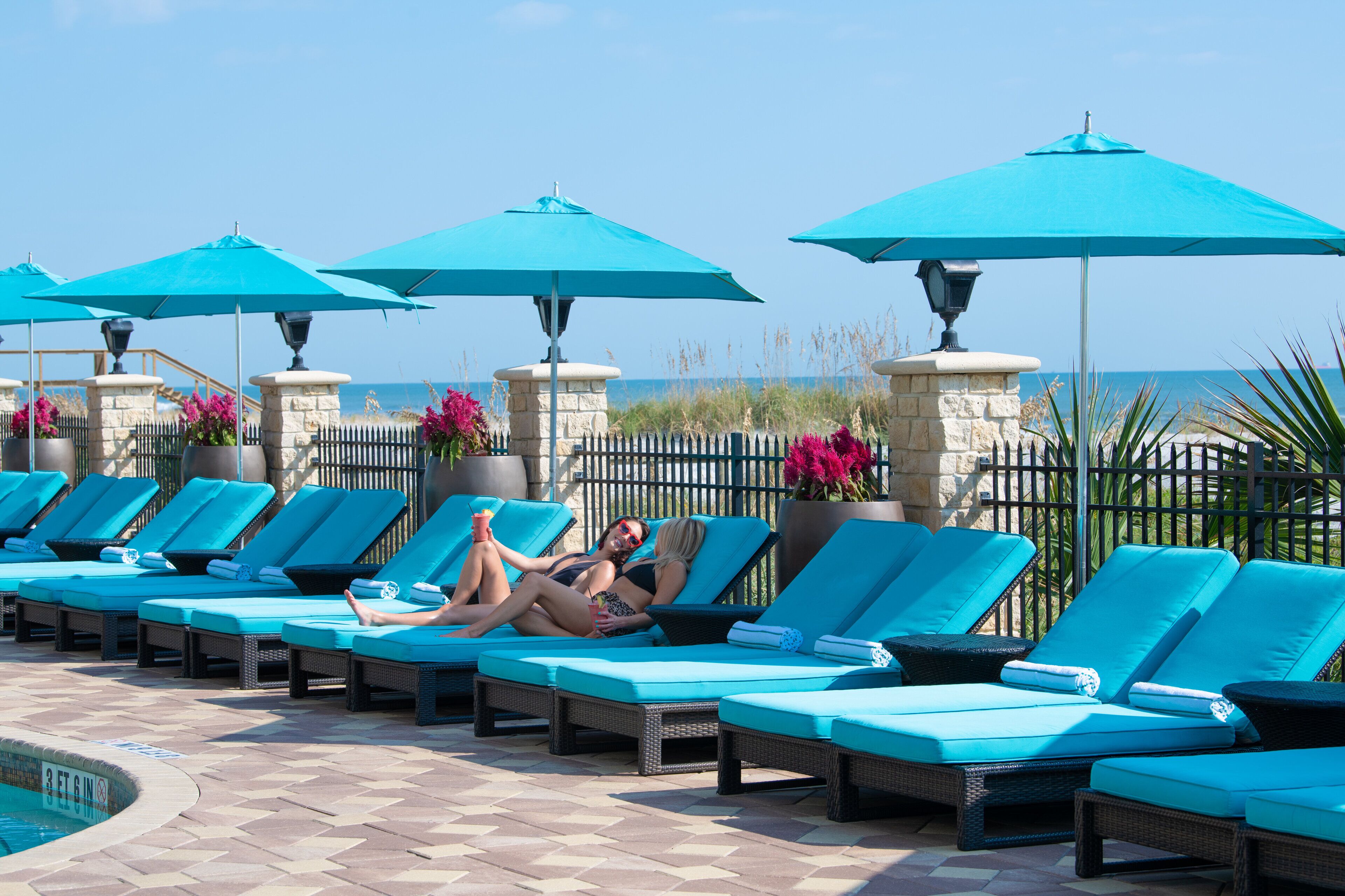 Outdoor pool, open 7:00 AM to 7:00 PM, pool umbrellas, sun loungers