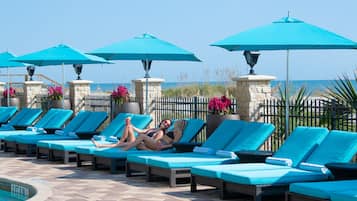 Outdoor pool, open 7:00 AM to 7:00 PM, pool umbrellas, sun loungers