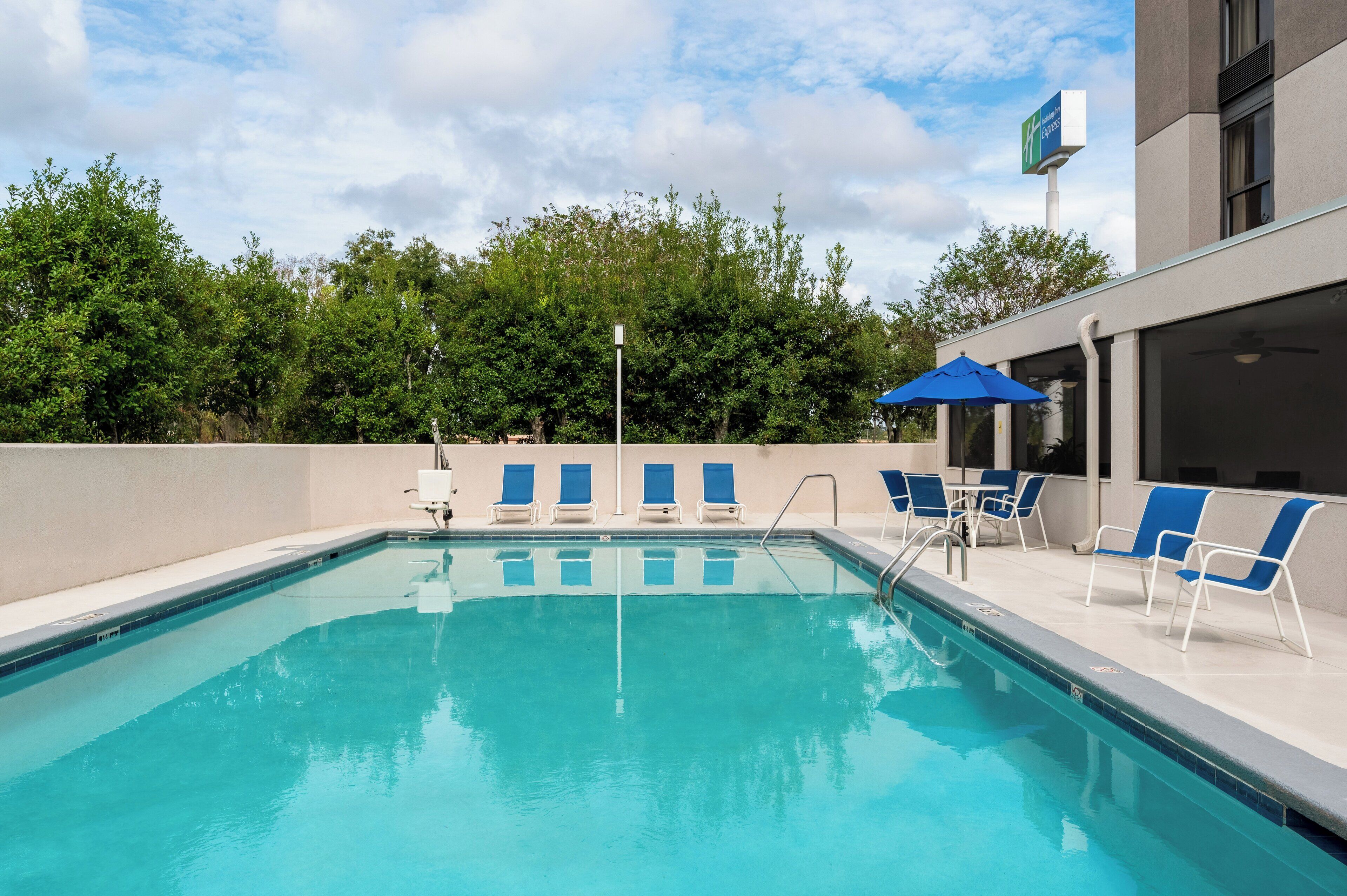 Seasonal outdoor pool, pool umbrellas, sun loungers