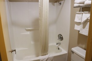 Premium bedding, desk, laptop workspace, blackout drapes - Empire Inn (San Bernardino)
