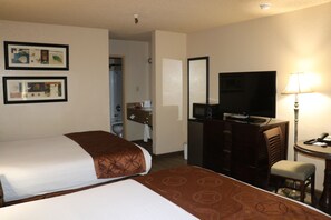 Premium bedding, desk, laptop workspace, blackout curtains