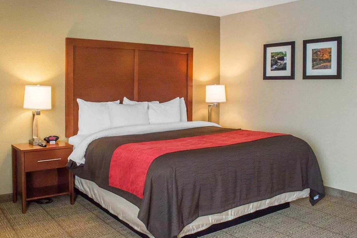 Premium bedding, desk, blackout drapes, iron/ironing board