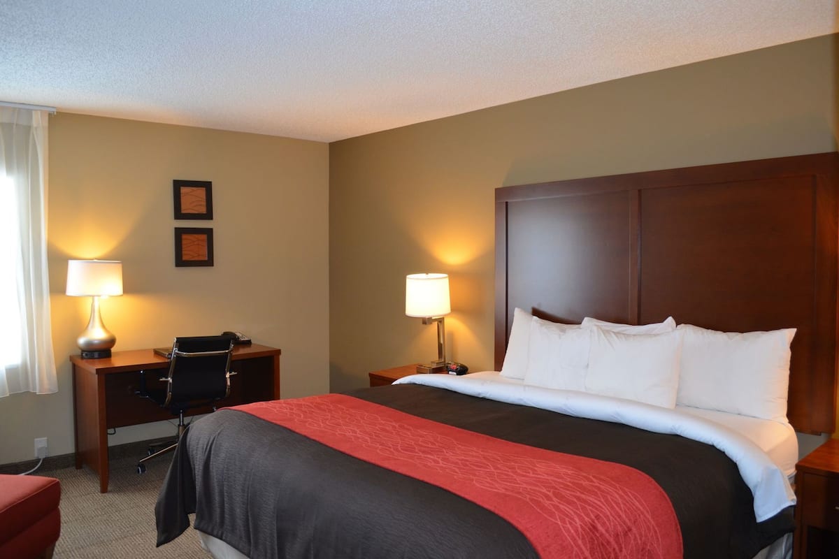 Premium bedding, desk, blackout drapes, iron/ironing board