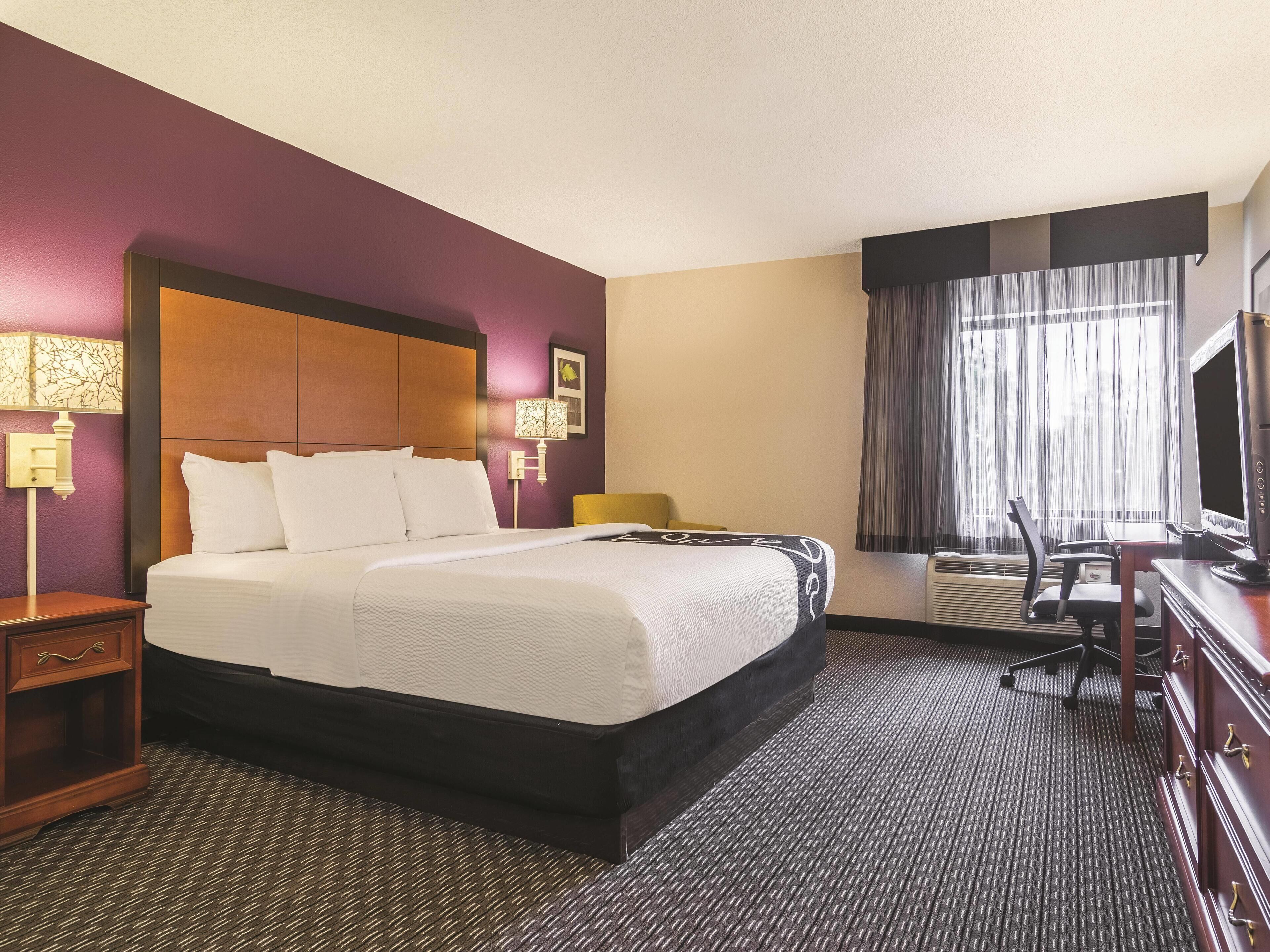 Premium bedding, desk, iron/ironing board, free cribs/infant beds