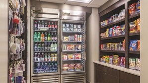 A vending area with a variety of snacks and beverages, including Doritos and Cheetos. - Wingate by Wyndham Brunswick GA / I-95 (Brunswick)