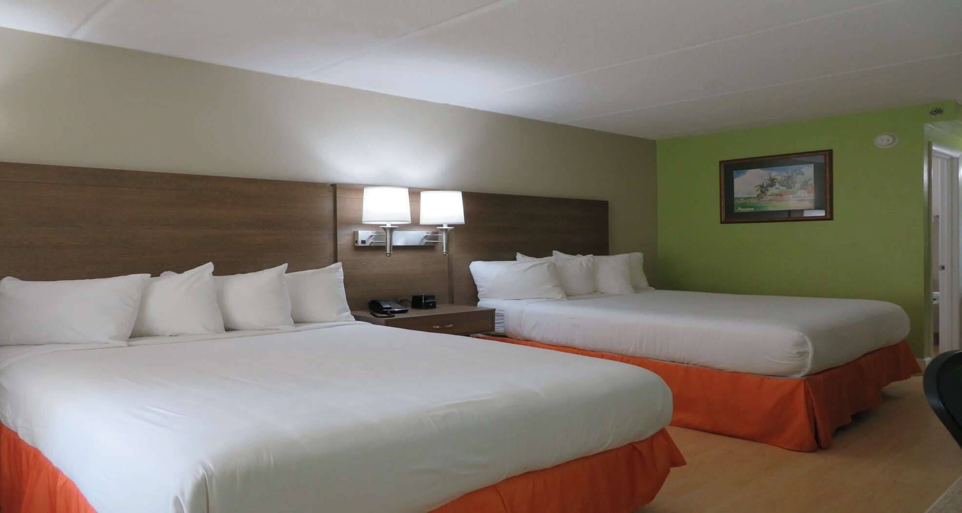 Premium bedding, desk, laptop workspace, iron/ironing board