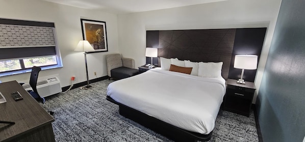 Suite, 1 King Bed, Non Smoking | Pillowtop beds, desk, iron/ironing board, free cribs/infant beds