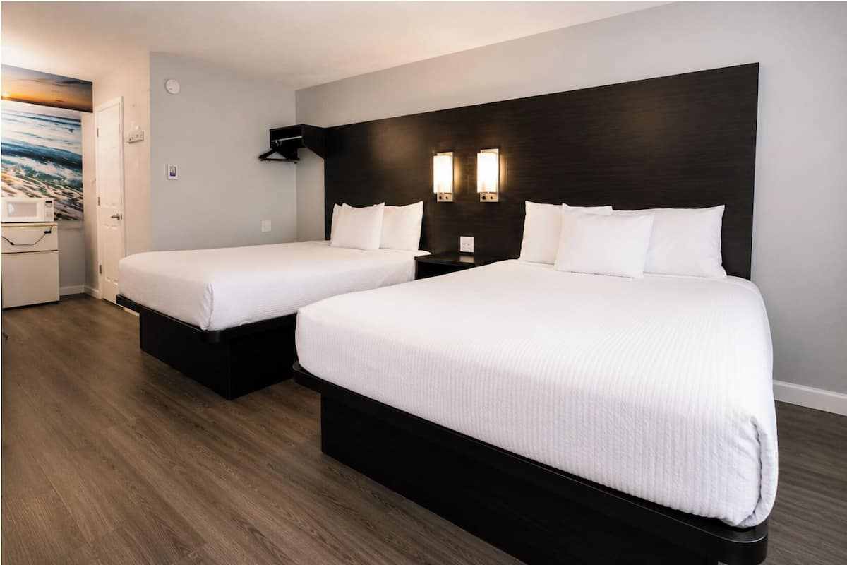 Premium bedding, pillowtop beds, desk, laptop workspace