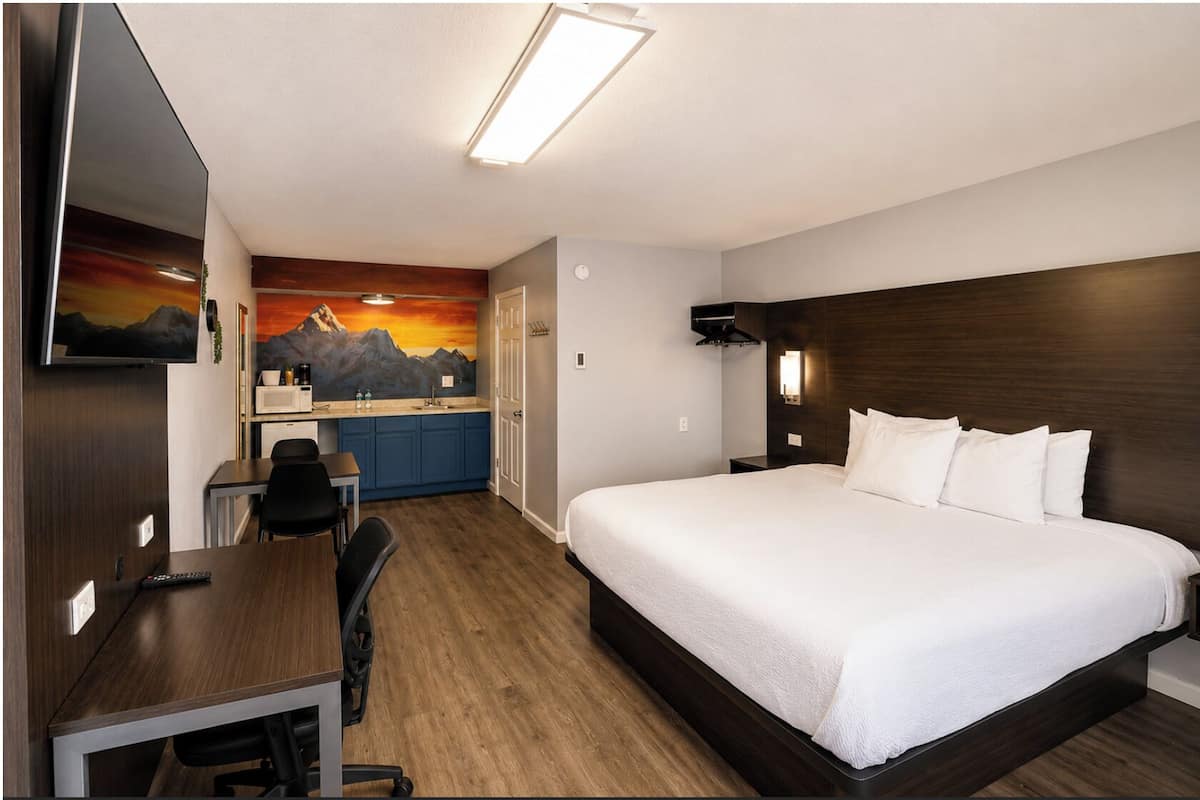 Premium bedding, pillowtop beds, desk, laptop workspace