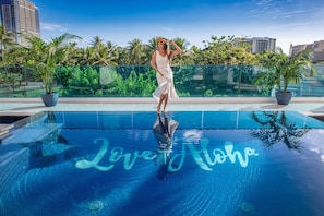Outdoor pool, open 9:00 AM to 8:30 PM, pool loungers