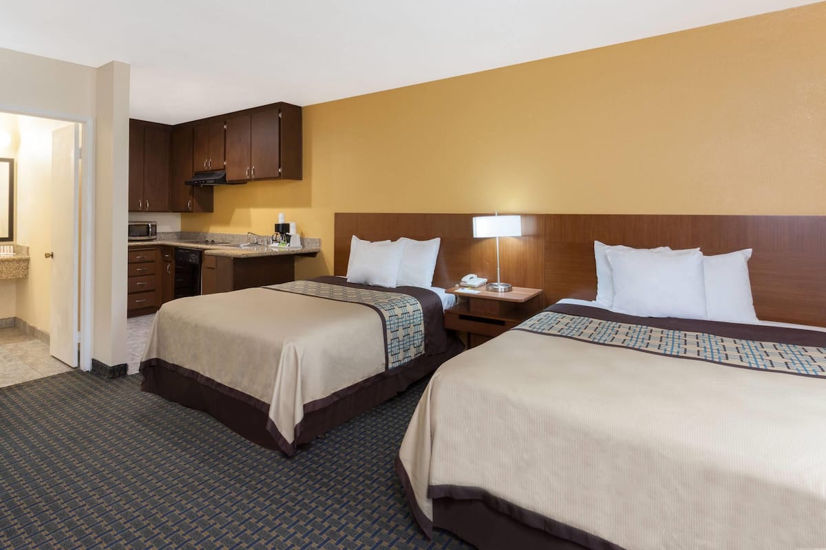 Studio Suite, 2 Queen Beds, Non Smoking | Iron/ironing board, rollaway beds, free WiFi, bed sheets