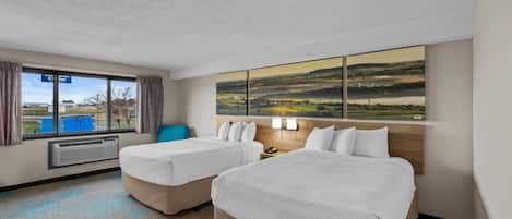 Chambre Deluxe, 2 grands lits, non-fumeurs | Bureau, fer et planche à repasser, lits bébé (gratuits)