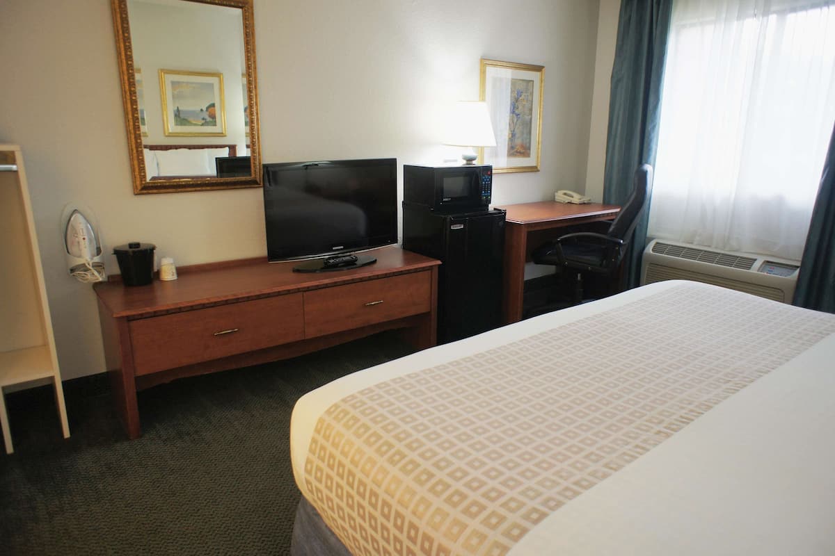 Pillow-top beds, desk, blackout curtains, iron/ironing board