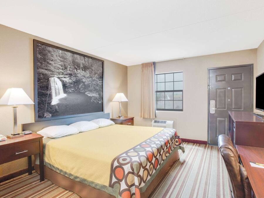 Room, 1 King Bed, Accessible, Non Smoking (Mobility) | Desk, laptop workspace, blackout drapes, free cribs/infant beds