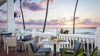 Daily cooked-to-order breakfast for a fee at Pelican Grand Beach Resort - A Noble House Resort