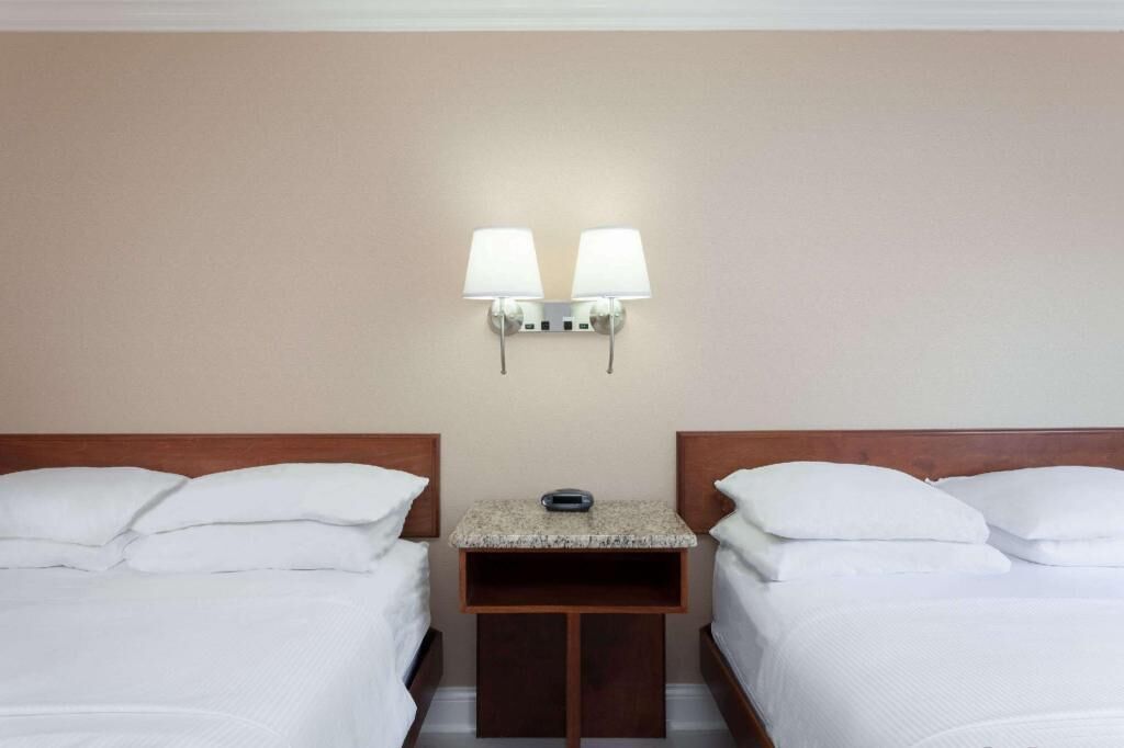 Hypo-allergenic bedding, pillowtop beds, desk, iron/ironing board