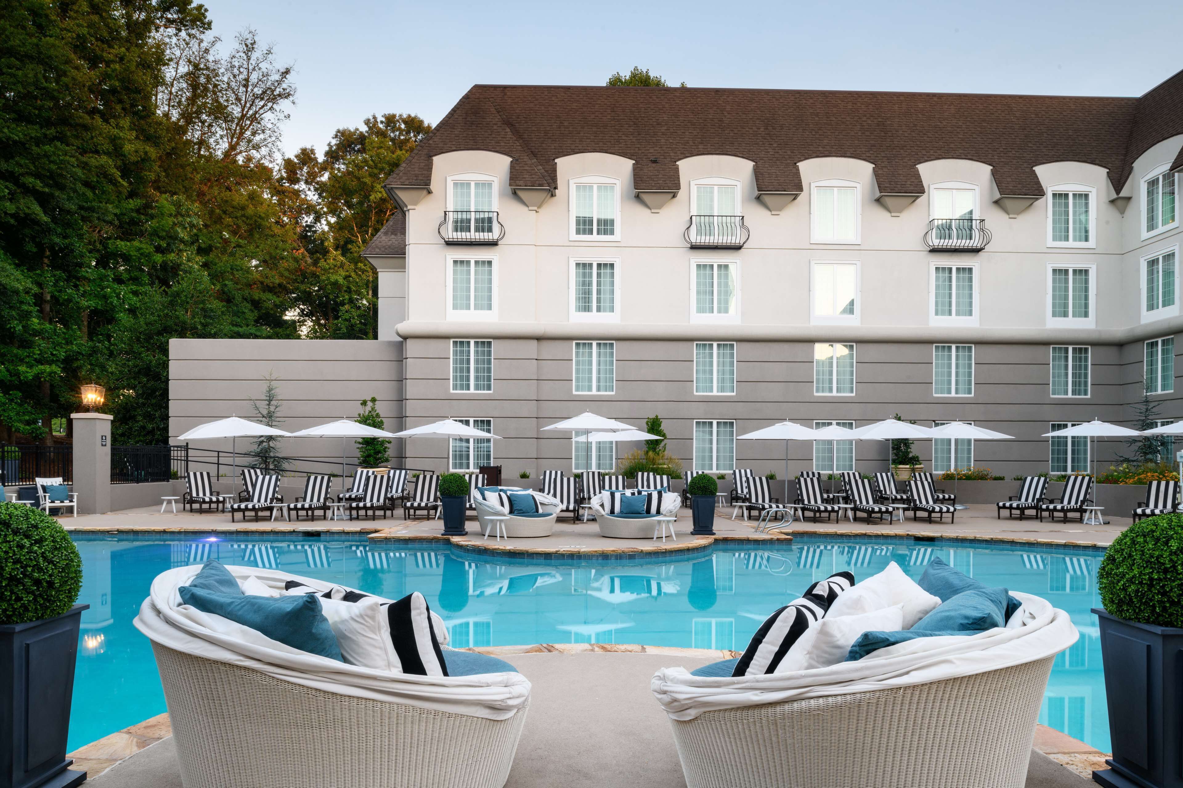 seasonal outdoor pool, pool umbrellas, pool loungers